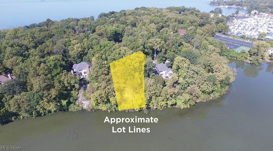 Amazing wooded and waterfront Building Lot in the Bluffs near Catawba Island Club (membership optional). Located at the end of the road on a private cul-du-sac, this Lot offers a getaway from hectic daily life with water views of lagoon, mature trees, rocky cliff features and wildlife abound. Where else can you see eagles, deer, fox etc. and take a short stroll or golf cart ride to the world class Catawba Island Club! Fabulous location.  A must-see property, build your dream today!