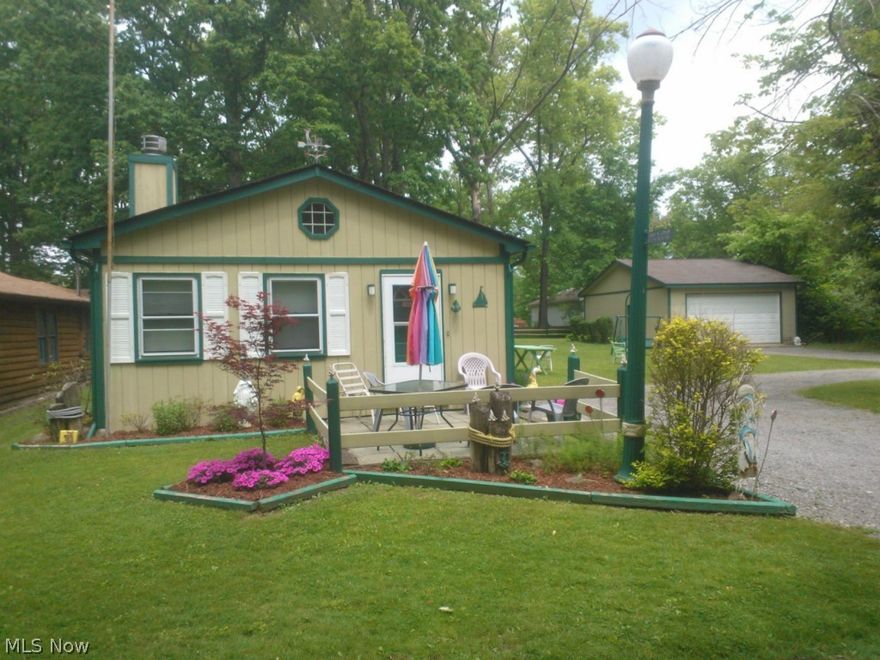 Well maintained 3 bedroom ranch home, 2 full baths, wood burning fireplace, 2 car detached garage, circle driveway, screened in pavilion. Nicely landscaped, large yard for your summer picnics and outings. Comes with DOCK!