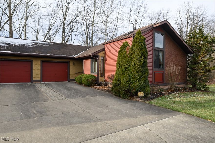 Welcome to your new home at 9556 Wilkshire Blvd! This huge, open concept end unit condo is a very well-maintained 2-bedroom, 2-full-bath in the Wilkshire community. It offers comfortable one-floor living with a functional and inviting layout. Built in 2005, the home features a bright living room with vaulted ceilings, skylight, and a cozy fireplace, creating a warm and open atmosphere ideal for everyday living or entertaining. There are loads of windows and the sliding door leads to a deck which has amazing mile-long views of nature. The kitchen is equipped with stainless steel appliances, ample cabinetry, and flows nicely into the dining area. Both bedrooms are located on the main level, including a spacious primary bedroom, en-suite and hosts a generous walk-in closet. This master bedroom and full bath have been professionally painted a modern, in-style color! All of the areas that have carpet on the main level and lower level is new professionally installed carpet. The laundry is also conveniently located on the 1st floor! A full basement provides additional finished living space, a finished craft or gaming room, and plenty of storage or flex options for a home office. Enjoy the outdoor living with a deck overlooking just beautiful acres of treed and hill green space. Additional highlights include an attached one-car garage with a separate door to the open deck, forced-air gas heating, public water and sewer, and a convenient location near Route 212 with easy access to Zoar and surrounding areas. Possession is negotiable. Located within the Tuscarawas Valley Local School District.