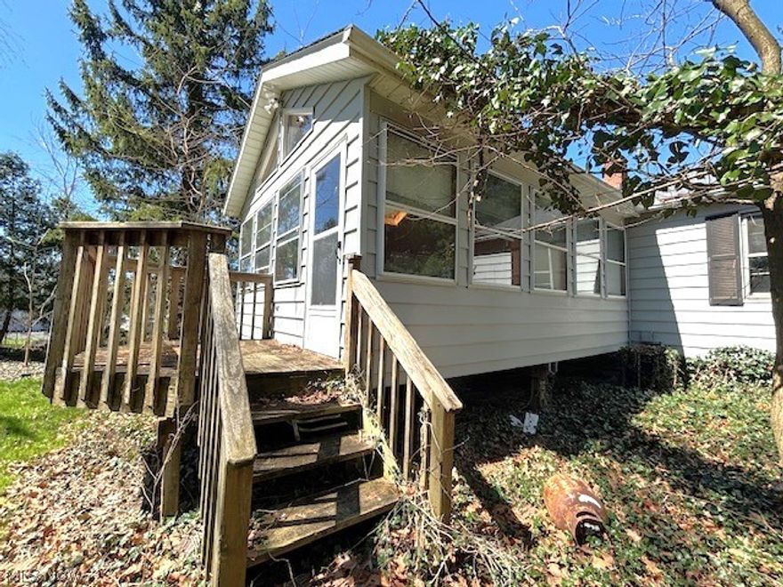 Investors! Roll up your sleeves! If you are looking for a full renovation project with a fantastic renovated value opportunity- look no further! This ranch style home offers 3 bedrooms, one full bath, living room, dining room, kitchen, plenty of storage closets/space, partially finished basement and a beautiful, large enclosed sunroom leading to a charming back deck overlooking a gorgeous 84 x 375 lot! Selling AS IS-Where Is- everything in/on property is how this property will transfer! Solon City Schools! Close to parks, restaurants, shopping, freeway access, hospitals and more! Contact today with questions or to see!