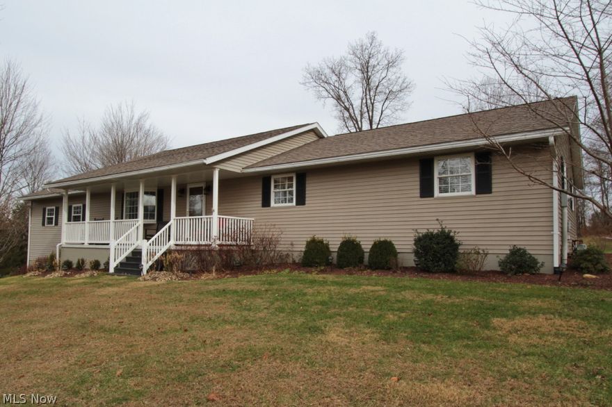 This Spectacular spacious 3 bedroom, 2 full baths, ranch home is nestled upon 5.02 acres of park like grounds . Spacious eat in kitchen with new granite counter tops, new porcelain title flooring , new tile backsplash , newer black appliances . Eat at breakfast bar with new granite counter and new bar stools .  Great area to watch the morning news on the flat screen tv located in the kitchen area .  Very nice size dining area overlooking the kitchen . New wood flooring . Huge living room with wood flooring and a beautiful bay window . Master bedroom has new carpet , walk in closet , master bath with garden tub and shower . Master bedroom also has access door that leads you to outside brick patio with gazebo .  Seller has a hot tub in this area but it will not stay .  2nd bedroom also has new carpet . 3rd bedroom has beautiful hard wood floor . Full bath has double sinks , large walk in title /glass shower. First floor laundry hook up for stackable washer/dryer set . This home is very w