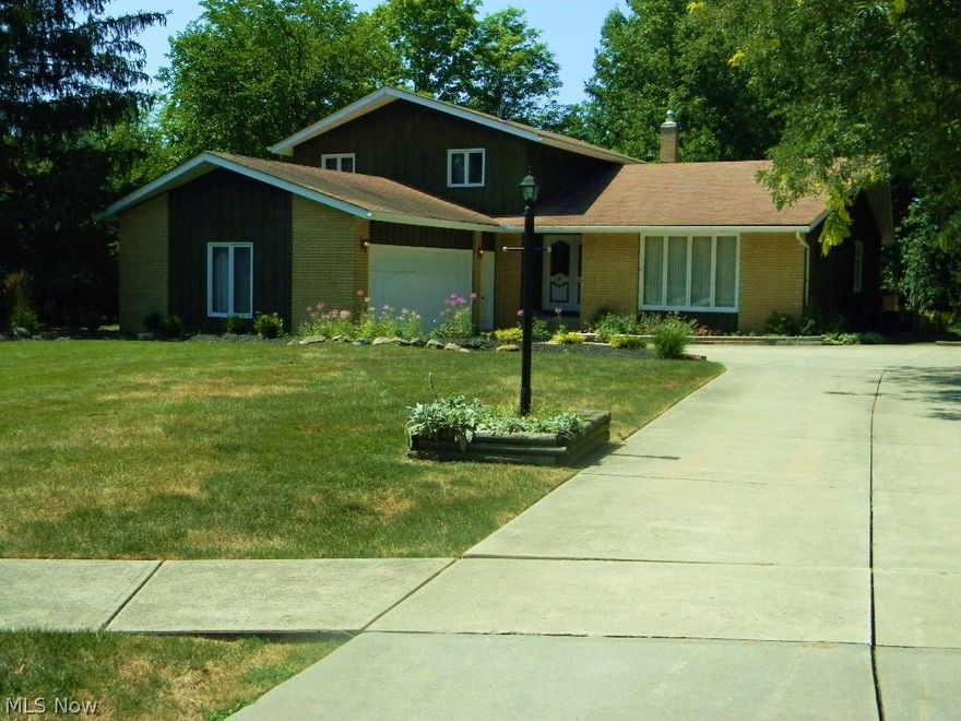 Lovely, spacious home located on a cul-de-sac with a magnificent wooded lot.  4 Br, 2.5 Ba, Split level which offers a large living room, dining room, and kitchen.  Off the kitchen is an extra large family room, fireplace, and a slider to a covered patio and also, a slider to a 27 x 17 deck.  Lower flr Br and Laundry/utility rm.  All bedrooms are a good size.  The driveway offers room to back up.  All appliances stay which are new.  Perfect home for a young family who want to enjoy the spacious yard.