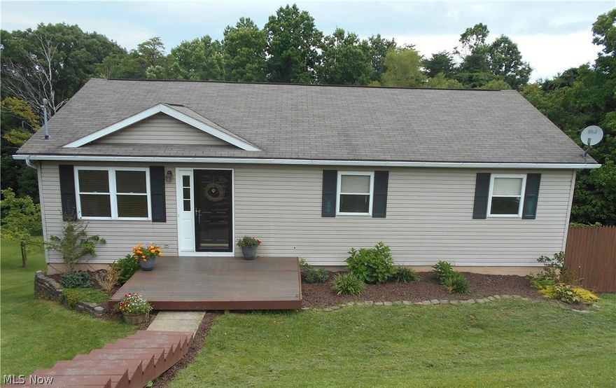4 bedroom, 2 full bath home located in the Warren School district, just outside of Marietta. Situated on a half acre lot, with wooded view in the backyard.  Beautifully remodeled kitchen, updated bedrooms & baths, and a fully finished, walk-out basement. This home offers an open concept feel when you walk in the door and see the gorgeous stone wall with gas log fireplace. Additional features include lots of built-in shelving, spacious laundry room, office space, new carpet in basement,& tiered back deck.