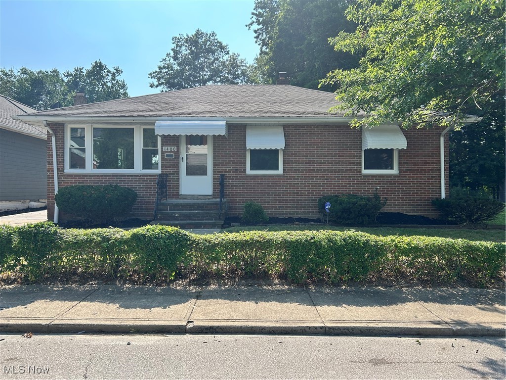 Beautiful 3 Bedroom Brick Ranch with 2 full baths, large finished basement and 1 car garage. Improvements include updated new kitchen with stainless steel appliances including refrigerator, stove, dishwasher and built in microwave and granite tops. Both baths are modern and updated. Other improvements include fresh paint and new carpeting in the basement. Features include hardwood thru out the first floor, large finished basement with 2 separate rooms and full bath, glass block windows, central air and garage remotes. Property to be point of sale compliant with the City of South Euclid.