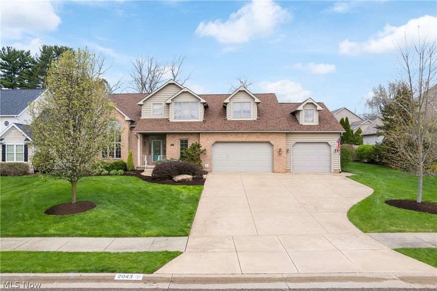 What more could you ask for?  Beautiful 3408 sq. ft. home in Washington Square offers an open, light & bright floor plan.  The dramatic  2-story Great Room features a Loft above & a cozy fireplace w/gas logs as a stunning focal point.  The main level also includes a formal Dining Room, spacious Kitchen, first floor Office, and a convenient Laundry Room.  Retreat to the luxurious 1st floor Master Suite, while a bright, year round Sun Room provides the perfect place to relax in every season.  Upstairs  you'll find 3 generously sized  Bedrooms & 2 full Baths, offering plenty of space for family or guests.  The finished lower level Recreation Room is ideal for entertaining, complete with a built-in wet bar, appliances, & dedicated Exercise Room.  Additional highlights include a heated 4-car Garage, a 20 kw whole house generator, beautiful landscaping, & a private patio area.  Enjoy the convenience of direct access to the Stark Parks Trail & nearby shopping & dining at Washington Square.  New roof.