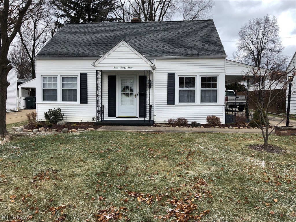 Beautiful white cape cod home with black shutters has such great street appeal. This home has an open frame porch that covers the side entry door with a porch swing as you enter from the driveway. The house is much bigger inside than you think with a huge 20x20 family in the back of the house right off of the kitchen. This large room has brand new carpeting (12-17) with a fireplace and many windows that let in a lot of natural light. The room also has built-in bookshelves that flank the fireplace on both ends. The downstairs dining room has beautiful hardwood floors with a corner window! The main bathroom in the house has been updated with new hardwood flooring. Two nice sized bedrooms finish off the main level of this home. The upstairs of the home is one large bedroom with many windows and expansive hardwood floors, with a huge closet that is 8 feet long. The lower level of this house has been completely repainted and has additional living space with a brick looking fireplace,