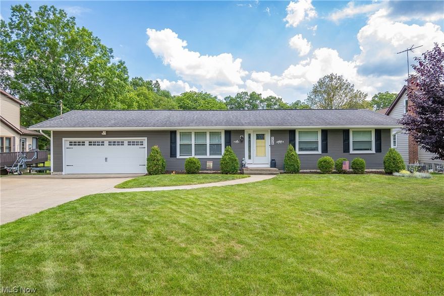 Your dream home awaits! Don't miss this exquisite ranch on Rex Lake channel with access to the main chain of Portage Lakes (Turkeyfoot Lake)! This is relaxation at its finest, boasting a beautiful deck, enclosed 4-season room w/ a bar & hot tub, a gazebo, dock with canopy, & more! Enter through the front door into a grand foyer & formal dining room featuring vaulted ceilings & newer hardwood flooring. Find your culinary inspiration in this stunning kitchen offering granite countertops, stainless steel appliances, & soft close cabinetry. Continue into the great room that gives access to both your oversized 3 car garage & beautiful deck overlooking the lake. Your main level owner's suite comes complete with walk-in closet, bath w/ double sink vanity, & new sliders w/ enclosed privacy blinds granting access to the deck. Entertain your guests in your enclosed 4-season room boasting a bar, gas fireplace, & hot tub! Walk-out basement includes the third bedroom, laundry area, full bath, & lar
