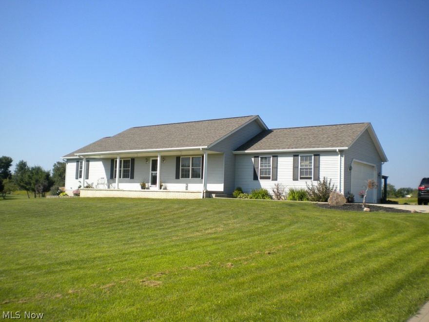 Gorgeous ranch in Wellington. Built in 2004, this 3 bedroom 2 bath home is sure to please. Custom built cabinets, beautiful hardwood floors, fireplace. Efficient heating and cooling. Sits on over 3 acres.