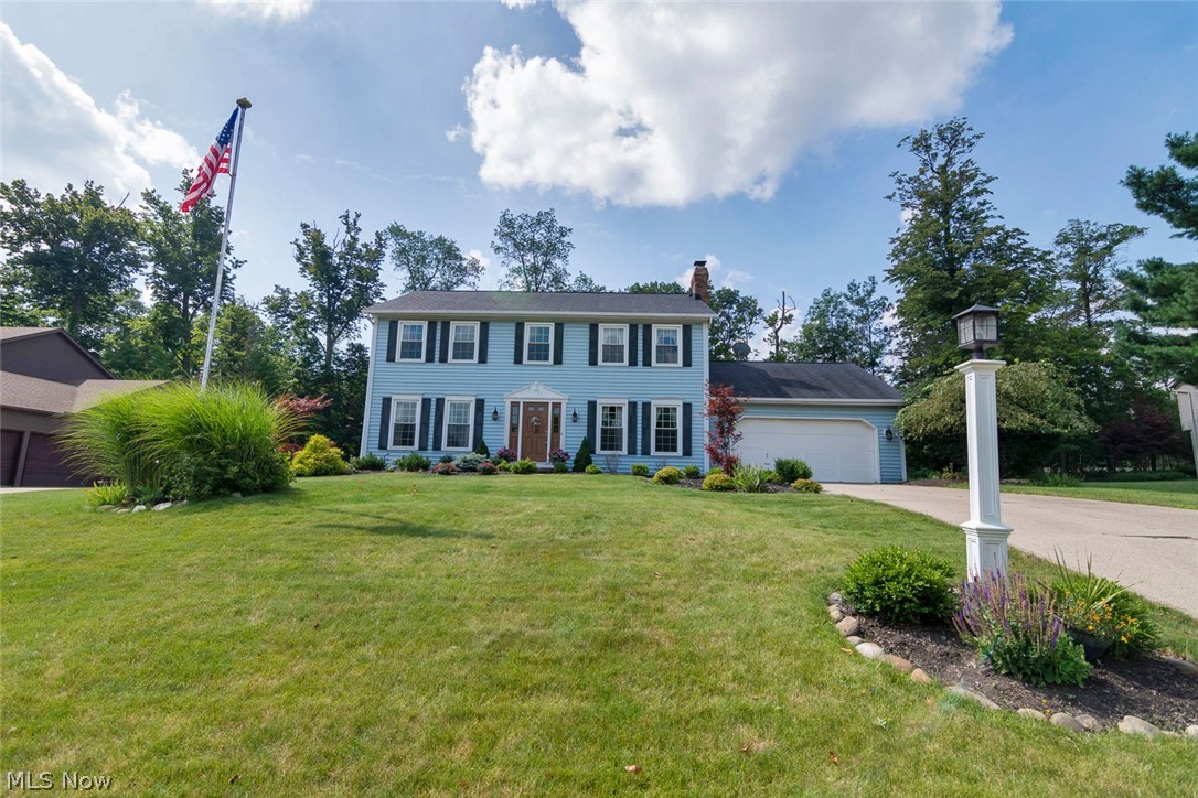 Move right in to this picturesque colonial on a cul-de-sac street in Brecksville! With over 2,600 square feet, professional landscaping, and a very spacious backyard, this center call colonial is just waiting for a new owner! As you step inside the two-story foyer, you will find the living room to your left and a family room with a beamed ceiling and a fireplace to your right. The kitchen features a breakfast bar, a pantry, and a sunny eat-in area with deck access. A large mudroom with custom built-ins, a half bathroom, and the formal dining room complete the first floor. Upstairs, you will find four spacious bedrooms and two bathrooms, including the master suite. The full lower level is nicely finished with a spacious rec room, a bonus room perfect for an office, and a newer full bathroom, plus a laundry area and plenty of space for storage. Outside, you are sure to enjoy cookouts on the back deck, and there is a storage shed and a basketball court in the large backyard. Located off o