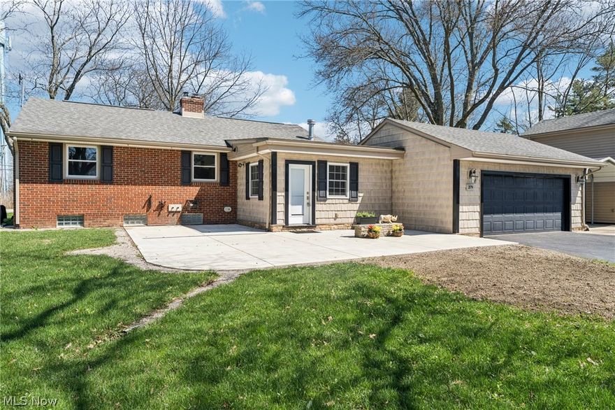 It’s rare to see a listing like this. The owner is a commercial construction professional who spent years remodeling and updating this brick Aurora ranch to a standard that is simply not common at any price point. Major renovations in 2016 and 2026 cover both the systems and the finishes. A full upgrade summary is available, but honestly, you will feel it the moment you walk in. The open main floor features hardwood throughout, a stone-surround fireplace with a cast-iron wood-burning insert, and a kitchen that stops people in their tracks. Custom C.A. Miller cabinetry with slide-out drawers, a center island with a second sink, a maple breakfast bar, and a full LG and GE stainless appliance package. The rear entry deserves its own mention. A Dutch door opens into a tiled mudroom with built-in cabinetry and a full bathroom with a urinal. It is a genuinely useful space that keeps the main house spotless. Three bedrooms and two fully remodeled bathrooms complete the main level. Downstairs is a finished recreation suite wired for high-end audio and media, a full kitchenette, and a laundry room with full-size LG units. Real finished space, not an afterthought. The detached shop is fully insulated, heated, and served by its own subpanel with abundant outlets throughout. The upper floor works as an office, studio, or additional storage. For anyone with equipment, trailers, or a serious hobby, this building is a major asset. The large blacktop and overflow gravel parking area off Bissell Road seals the deal. Three-plus acres of mature trees and privacy. Come take a look.