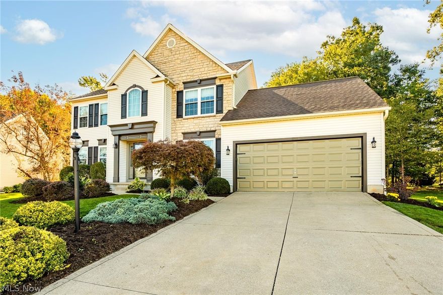 Welcome to this stunning 4 bedroom 3-1/2 bath home located in highly desired Montville Township. This Premier Builders home is full of curb appeal, with stone front accents and beautiful landscaping. Upon entry into the foyer, you are greeted by an open concept first floor that includes a beautifully updated iron spindle staircase. LVT flooring in the living room, family room, and foyer. Newer carpeting, with memory foam padding; updated windows, patio door, light fixtures; and fresh paint. The eat-in kitchen includes granite countertops and stainless steel appliances. The family room has a cozy gas fireplace that is perfect for those cold Ohio nights, while the connected living room makes the space even more versatile for family gatherings. The space can also be used as an office. The elegant dining room boasts a tray ceiling and beautiful oak trim. On the second floor, you will find a spectacular owner's suite with vaulted ceilings, modern farmhouse shiplap walls, a newer tiled shower, and a claw-foot soaking tub that is perfect for soaking your cares away after a long day. The walk-in closet includes new shelving and cubbies, making it easy to organize. Three more bedrooms and a full bath complete the second floor. The finished lower level includes an updated full bath, cozy carpeted entertainment area, workout area, ample storage space and a work/utility area. The larger-than-average backyard boasts a spacious 15' x 17' Trex composite deck that overlooks a beautifully landscaped .47 acre wooded lot with lots of privacy, making it perfect for outdoor entertaining. The invisible fence is an added plus! This beauty won't be on the market for long! Schedule your showing today!