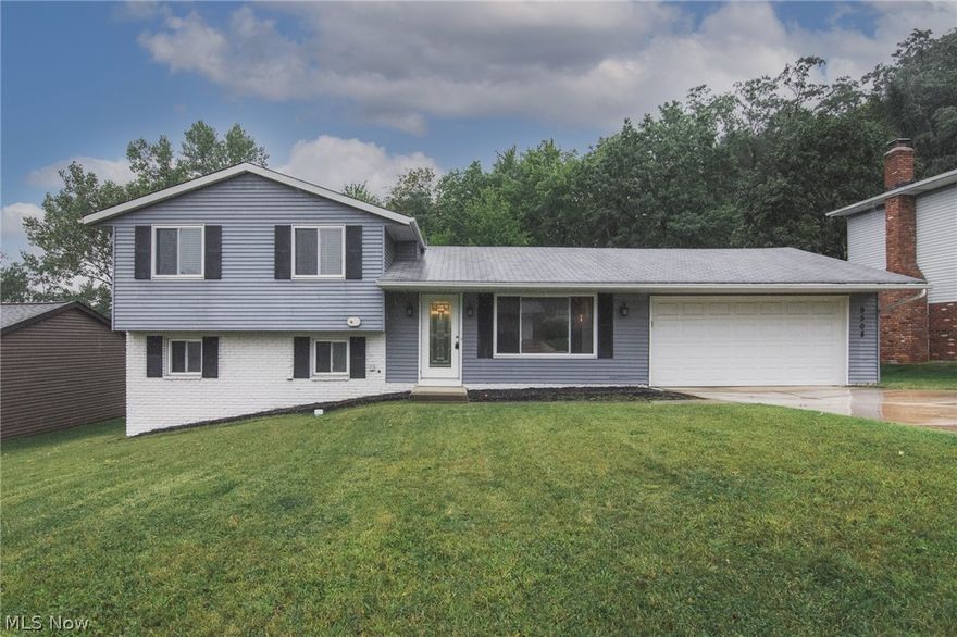 Move right into this charming, updated split-level on a quiet street in Parma! This home features a welcoming open floor plan, spacious living areas, several recent updates, and a tranquil back yard. The front door opens into the living room which is illuminated by a lovely picture window. Newer vinyl plank flooring flows from the living room into the eat-in kitchen. Here you will find stainless steel appliances, crisp white cabinets, and a newer sliding door that opens to the back deck. The upper level includes three sizable bedrooms and a nicely updated full bath. You will love the spacious family room in the lower level! Here you will find a wood-burning fireplace, storage closets, and a billiards table that is included with the home! A bonus room off of the family room connects to the laundry / mechanicals room that includes a half bath with a shower. Additional improvements include a newer garage door and opener, all windows, a new furnace in 2018, and more! Located in the desirab