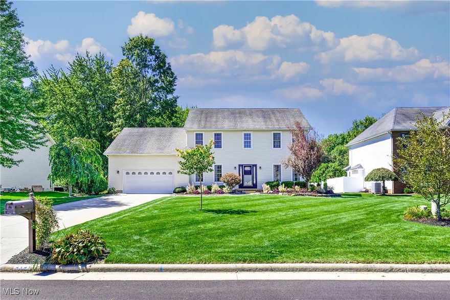 Stunning 4 bedroom, 3.5 bathroom home in a lovely neighborhood in the Howland school district. Walking in the front door you are greeted in a foyer flanked by the formal dining room and the formal living room (or home office space). The spacious eat-in kitchen is truly the heart of this home with a center island and granite countertops, it comes with all appliances included. The 1st floor laundry room, 1/2 bath and access to the oversized 2 car attached garage come off one side of the kitchen. On the other side the kitchen is open to the family room with a gas fireplace & built-ins shelving unit. Also off of the kitchen is a 20x16 four season room leading to a large composite deck and stamped concrete patio with direct access to Howland Park from the backyard. All 4 bedrooms and 2 full baths grace the 2nd floor of this house. The full basement is partially finished with a rec room, full bathroom and 5th bedroom/ home gym/ or office. A large unfinished area is perfect for all of your storage needs. Zone heating & cooling, whole house generator in 2017, beautiful crown molding throughout this METICULOUS house. Home warranty provided, call today!