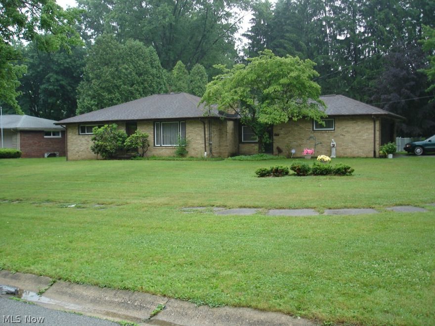 Really sharp brick ranch. Living room, fireplace marble sills, formal dining room, large family room with bay window, kitchen with appliances, bonus room, 2 large bedrooms, park setting, full basement, attached garage, partially finished basement with large storage area.  Replacement windows, newer roof, shed, newer furnace, central air, water tank, oven, dishwasher.  Fenced in yard.