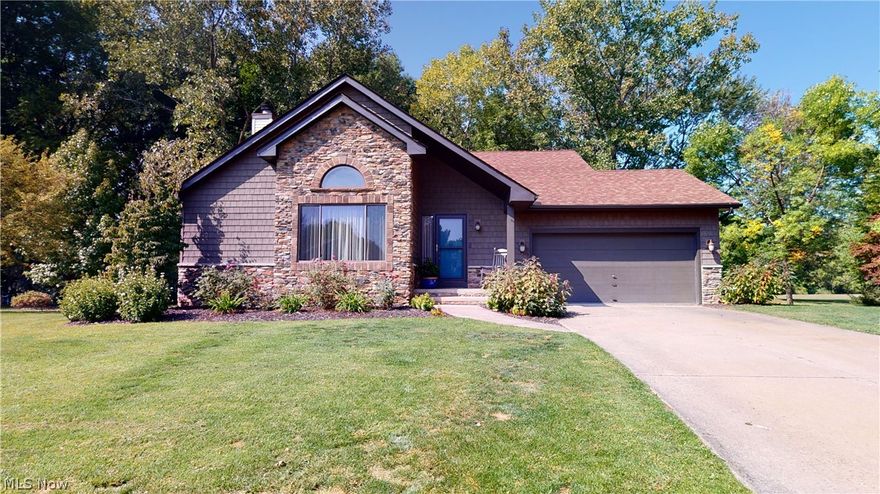 Welcome home to this adorable 3 bedroom, 2 full bath ranch nestled away on a cul de sac in South Mentor. The inviting living room boasts a wood burning fireplace, large window for lots of natural light and vaulted ceilings. The kitchen features tons of cabinets and new hard surface counters, new sink, faucet and disposal. There is a slider out to the large deck off the kitchen perfect for those summer cookouts and get-togethers.  The deck overlooks the private backyard that backs up to green space giving you the feel of a much bigger property but you don't have to maintain it!  The master has a walk-in closet and en suite bath featuring a jacuzzi tub and a walk-in shower. The exterior front of this home has been renovated and the deck, roof,  and windows are 7 years young, furnace 6 yrs and A/C is 1 year w/warranty. Close to so many amenities!