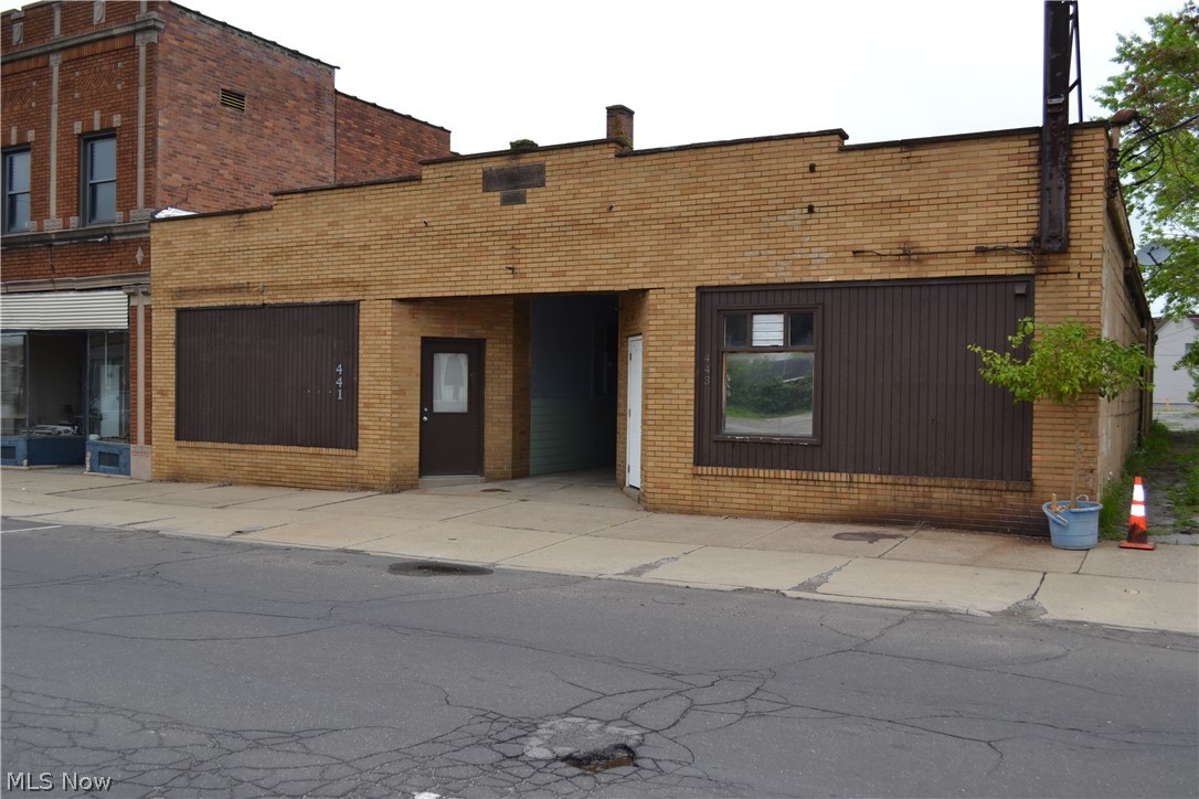 Investment opportunity awaits! 3 units in a resurgent downtown area. Unit 1 is 49 x 20, unit 2 is 44 x 20 & unit 3 is 46 x 43 - a bar space complete with bar, coolers, ice maker, dance floor & DJ booth. Access to an outdoor patio with an additional bar area. Property boasts a paved parking lot for up to 30 cars. Call now to see this investment property!