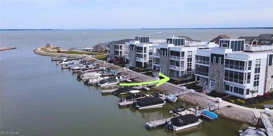 It's ready! This condo is ON THE WATER and all yours. BONUS: an included 40' private dock slip right aroound the corner! A 1st floor 3bed/2bath home with nothing but water views from inside and outside plus a walk out patio off your living space and master bedroom. The best part is a unique, shared rooftop deck - wide open 360 views of the bay! Perfect for a morning coffee alongside the sunrise and sunset. A private gated community located bayside with a marina, natural beach, waterfront clubhouse and pool, decks, gazebo, private resident clubs, live summer music and events, boat expos and much more.