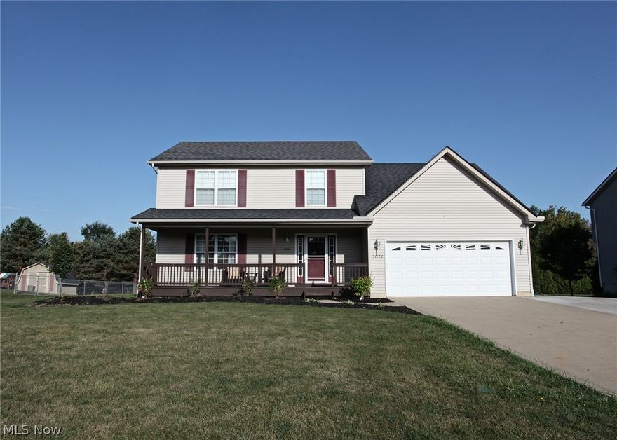 WOW! Large colonial with vinyl siding, deck and enormous backyard await the Buyer looking for value in N. Ridgeville! fresh subtle paint colors invite you in and the  large kitchen that is open to family room with FP, is a perfect gathering room . Home has full fin basement that is ready for entertaining. 4 large bedrooms with 2 full bathrooms up and upstairs laundry room.There is Lots of living space for the Buyer wanting more room for oversized furniture. The Kitchen has plenty of countertop space to express your culinary talents. Over 2200 sq ft of living space not including the finished basement. Desirable area with nearby local amenities and highway access within 2-3 miles.