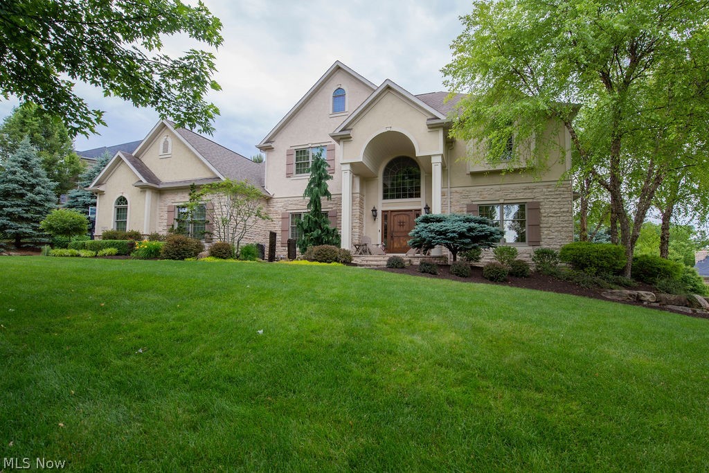 Quality is evident in this beautiful custom built home by Premier Builder Memmer Homes. Exquisite detail throughout like hardwood floors, crown molding, and fantastic Schrock Kitchen with granite counter tops and stainless steel appliances open to large Dinette and Great Room. Two-story Great Room and Foyer add dramatic effect with loft above. First floor Office, Master Bedroom and Laundry, finished lower level Theater Room, and workout area. Gorgeous professionally landscaped park-like setting to enjoy from pergola covered, stamped concrete patio. So much more too!