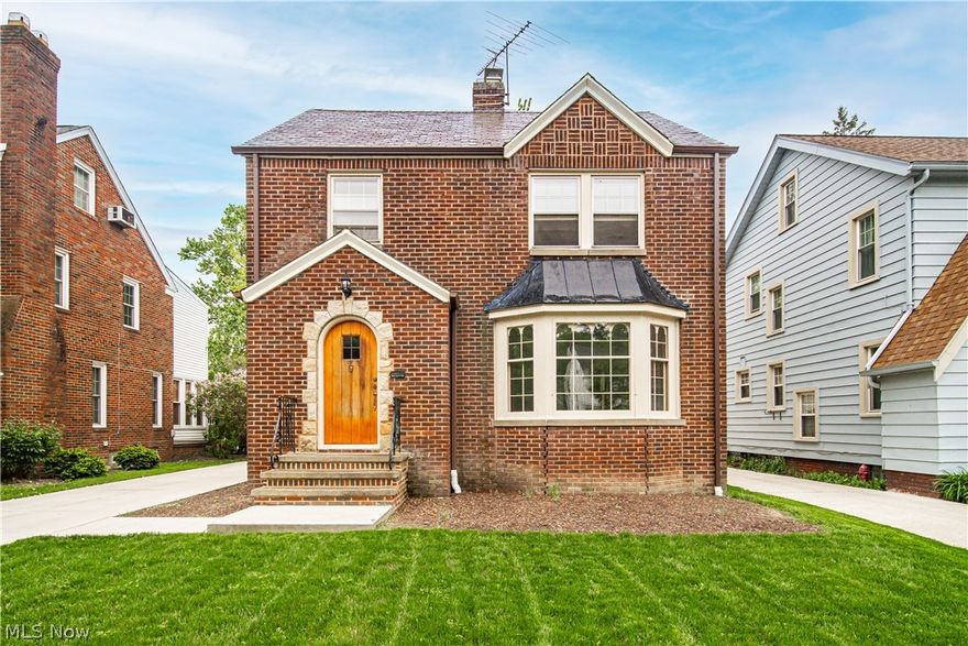 Active lakefront and Utopia Beach club community in Euclid!  This brick colonial offers three bedrooms, finished third floor, a first-floor addition suite with a full bath, a first-floor half bath and a two-car detached garage.  Many major upgrades include but are not limited to kitchen remodel, updated electrical panel and wiring throughout, driveway, lawn, glass block windows, freshly painted interior, three toilet installs, some newer fixtures and replaced basement glass bock windows.   Front Foyer welcomes you into the living room with wood mantel former fireplace. A lot of natural light in the living room with a bunch a space.  Formal dining with built-ins could be used as an office and or playroom.  Remodeled kitchen with all appliances and seller is providing a one-year home warranty.  First floor bonus room with a full bath!  There is also a half bath near the side entrance door.  Three bedrooms, cedar closet and full bath on second floor. All three bedrooms have hardwood floors. Second floor full bathroom is original minus the toilet.  Bonus room on the third floor!  Recreation room and separate laundry room and two storage rooms in the lower level. The ceiling is also finished in the partially finished basement.  2 car detached garage with electric!  Located close to shopping, restaurants, schools, Wildwood State Park, Waterloo Arts and Entertainment District and minutes to Downtown Cleveland and University Circle!  Immediate Possession.  Don't miss your opportunity own this super house in a great neighborhood!  Seller will not make any repairs and or replacements to property. City of Euclid Exterior inspection complete and Buyer to Assume Violations!