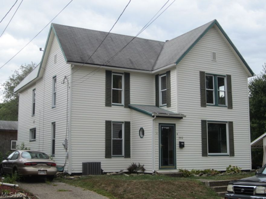 Completely remodeled 3 bdrm, 2 full bath, 2 story home with brand new kitchen with large island, cabinets, windows, doors, furnace, ac, hot water tank. New paint, carpet, front door and foyer, large back deck with storage bldg. Street and alley access, ball diamond across alley.