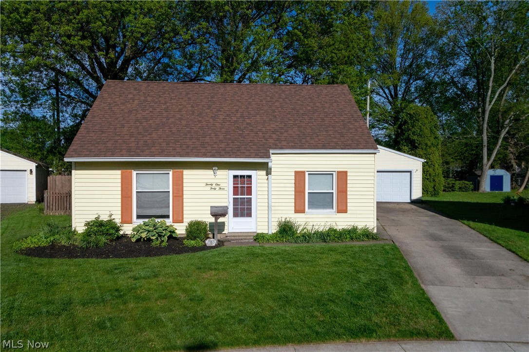 2143 Suncrest Cir, Cuyahoga Falls, OH 44221 is an awesome Cape Cod with 4 bedrooms (2 on the 1st floor & 2 additional bedrooms on the 2nd floor) with 2-car detached garage with plenty of space for workshop and all your tools. Awesome open framed covered patio includes Hot Tub for your enjoyment! Private oasis in the back yard includes privacy fenced rear yard and trellis with mature trees. You will love the updated kitchen with granite countertops, plenty of cabinetry & roll around island, includes all of the upgraded appliances as well as just steps to the laundry including front load washer & dryer! Better yet.....New roof on the home AND the garage, additional updates include new carpet throughout, kitchen & bath updates, replacement windows, & much more. Don't miss out on this well priced home ready to make your own! Home warranty included for Buyers peace of mind for the entire 1st year of ownership!