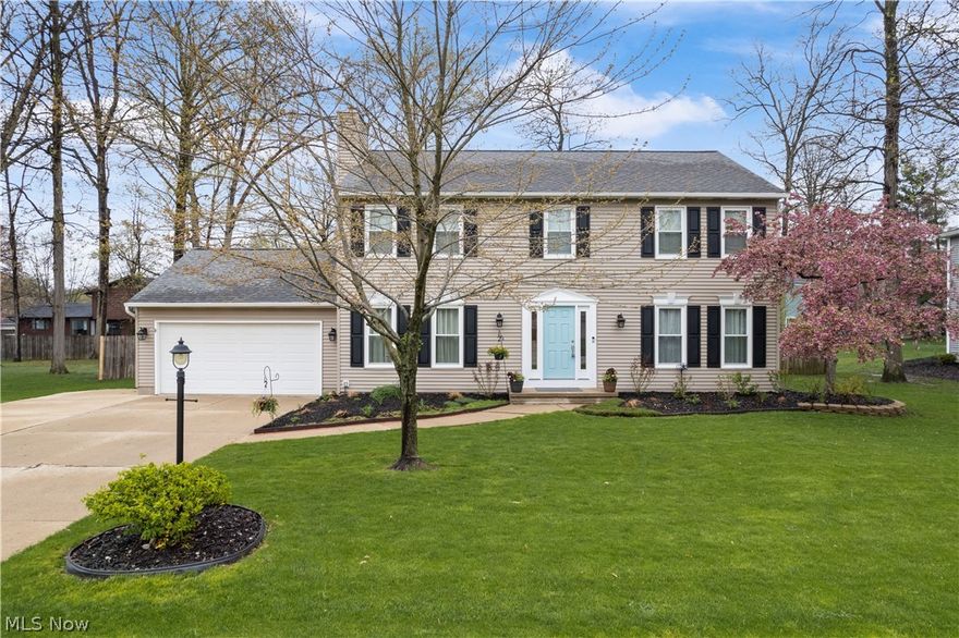 Pride of ownership and a gorgeous first impression is what you'll notice about this colonial home ready for its new owner! Many major updates the past 2 years with new siding and insulation, gutters and gutter guards, furnace and central air. Drive has an extra parking pad, too. Windows are approximately 8 years old with a transferable lifetime warranty. Backyard has a 6ft full fence, patio, and storage shed. Inside the home, you're greeted with a spacious foyer with a formal living room on one side and a great room with a wood-burning fireplace on the other which flows into the formal dining. All new carpet throughout the main level. Kitchen has access to the first floor laundry with an eat-in area in between. All 4 generously-sized bedrooms are upstairs with access to a full bath in the hall. Primary bedroom has a private entry to a full bath. Partially finished basement. Come take a look and make this your home today!