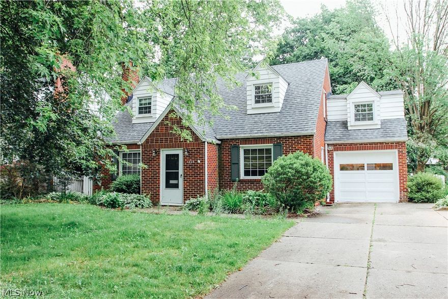 Welcome to this absolutely charming mid-century brick Cape Cod in the heart of West Akron! The inviting living room features a hardwood floor and gas fireplace, and flows openly to the dining room. The kitchen is updated with cherry cabinets and includes all appliances. It is open to the large, fully fenced back yard, which includes an inviting deck and patio plus a storage shed. The downstairs bedroom could be an office, and there are two large bedrooms and a second full bath upstairs. You will love this home! The basement has an additional finished recreation space for your enjoyment. The home has been pre-inspected and many rooms are freshly painted. A home warranty is included for your peace of mind! Lease to own is an option!