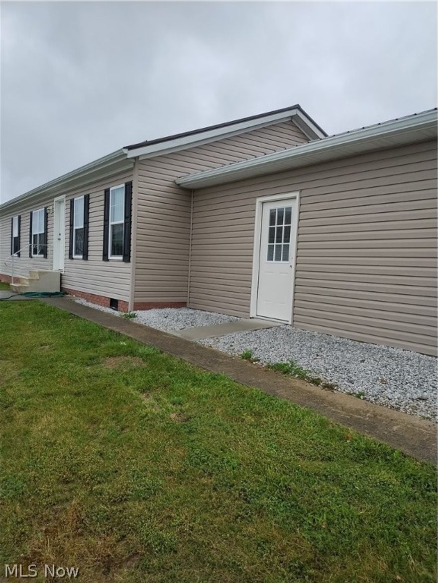 The home is a 2013 Manufactured ranch style home situated in Pine Grove Community. Home features an open floor plan living room, kitchen and dining area with 4 bedrooms and 2 full baths as well as a laundry room. Home also features a newer metal roof as well as a newly attached 2 car garage just added in 2024.
The home is located in a community type setting with a monthly lot lease of 310.00 per month. Lot lease includes lawn care, snow removal and garbage.