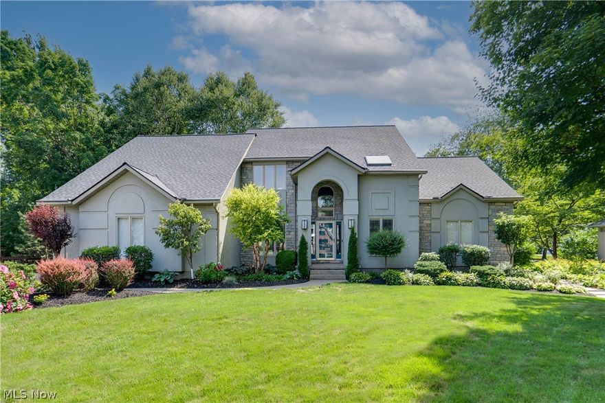 Pristine home in the desirable Ridgewood Lakes neighborhood. From the moment you enter the foyer you’ll notice the unique architecture of this home. The two-story great room is the heart of this home and features floor to ceiling windows and a gas fireplace with built in open shelving, giving it a modern flair. The great room is open to the remodeled kitchen with new cabinetry, Cambria countertops and high-end Samsung appliances. New LTV flooring flows from the kitchen, through the laundry, wet bar, dining room and great room. The music room just off the foyer could also be used as a formal sitting room or home office. The first floor owner’s suite has newer bamboo flooring, trey ceilings and completely updated bath with new cabinetry, flooring, custom tile shower and large walk in closet. The second story of the home is where you will find three additional bedrooms, full bath plus a large bonus room or fifth bedroom. The lower level adds an additional 1,377 square feet which includes