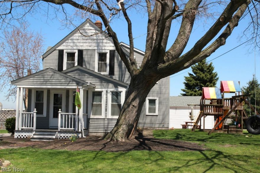 Welcome to this cozy home in Brooklyn Hts! 4 bedroom, 2 bath Colonial with many updates. Kitchen recently remodeled with granite counters and stainless appliances; plenty of counter space, window seat and room for a large table. Large dining room and living room with beautiful woodwork. Front room could be used as sunroom or office. 4 bedrooms upstairs, 1 being a tandem bedroom. Finished basement with NatureStone flooring. Pretty yard with large Kayak pool, deck and patio. 2 car garage. Cuyahoga Hts School district. Roof and gutters replaced 2004. Replacement windows throughout. Home warranty included. Come see this lovely home today!