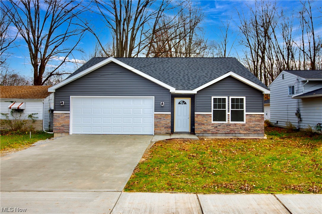 Welcome home to this beautiful three bedroom, brand NEW home in North Ridgeville! It has a large great room with an open floor plan and eat in kitchen, which is great for entertaining. The kitchen is custom with quartz counter tops, white shaker cabinets, with a large island, all with soft close drawers. The master bathroom is a glamour bathroom including a titled shower with & a large soaking tub. You'll also enjoy the walk in closet right off the master bath. You don't want to miss this gem of a house! Pictures are virtually staged to give buyer idea of furniture placement. House has never been lived in and buyer able to have final walk thru- prior to close.