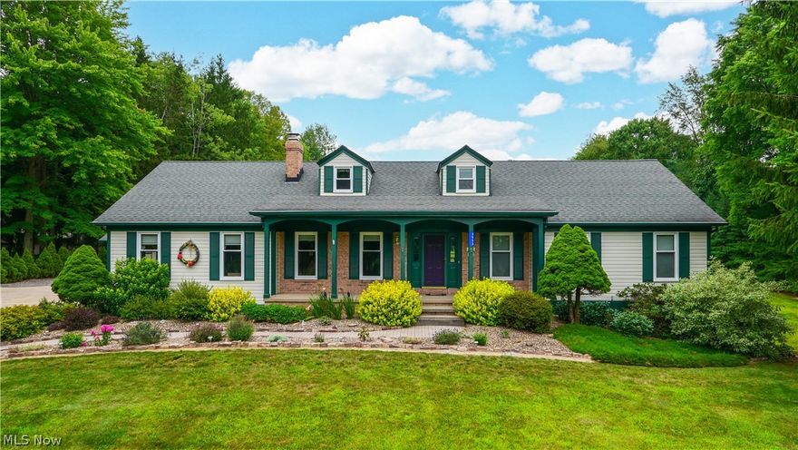 A home designed to enjoy both outside and inside.  Beautiful ranch style home located on 5 impeccably maintained acres (this tree lined lot includes a large stocked pond and approx 2 acres of woods).  This 4 bedroom, 3.5 bath home with hardwood floors throughout includes a home office; finished walk-out basement; finished loft with dormers and storage closets and new upgraded windows and sliding glass doors.  The updated electrical/gas utilities and appliances, wood fire insert,  central air, central vacuum system, and jetted tub in master bedroom create a move-in ready home. The asphalt drive leads to a 3.5 car garage and 13 x 24 storage building.  A covered patio with ceiling fans adjoin the master walkout deck, and leads to the brick patio with fire pit and the 12x16 pond dock.