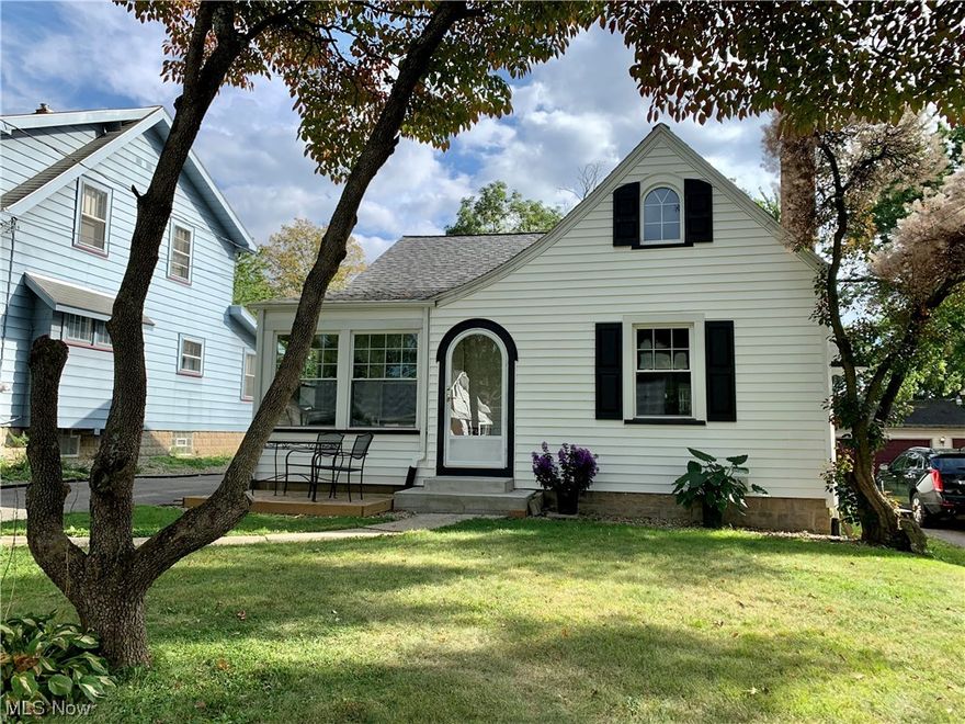 This quaint home has personality plus! From it's arched doorways to it's beautiful woodwork & original kitchen hardware ~ You won't want to miss this move-in ready home. Enter through the front door & to your left is a relaxing sunporch - a great space to watch the thunderstorms or curl up w/a good book for the evening! To the right takes you into the soothing living room w/beautiful woodwork & a brick fireplace. The living room opens up into the well lit dining room & eat-in kitchen area. Enjoy coffee or cocktails in the nook! Meander over to the other side of the dining room & you'll be led into the 2 chic bedrooms & full bathroom. Enter into the Attic through the 2nd bedroom. Although the Attic is not finished it would certainly make an amazing 3rd bedroom or playroom as the main area is 26' x 10' (w/9 ft ceilings) & there's plenty of additional storage off to the side areas (which aren't included in those dimensions!) Picture the Attic complete w/drywall painted in a light neutral color palette w/soft plush carpeting & a gorgeous crystal chandelier hanging from the rafters!! Tons of upgrades: fresh paint in every room; lower level drylocked/retuck pointed; new vinyl flooring/subflooring in sunroom; new cement poured in garage w/draining added (window being added this weekend); new front steps/stoop; kitchen remodeled (backsplash, GFCI's); new light fixtures; Energizing Connect Lighting System throughout home (controlled on an App which changes colors of lighting).