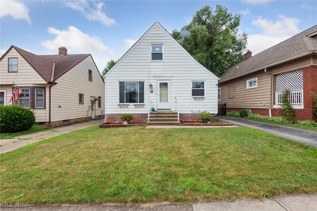 Welcome to 4315 Woodway Avenue! Located just minutes from I-480, this charming Cape Cod has so much to offer. Hardwood floors run throughout both the first and second floors. Step into a light-filled living room with a large picture window. updated galley-style kitchen includes granite countertops, stainless steel appliances, and a versatile breakfast bar that can double as an office nook. Two bedrooms and an updated full bath are located on the main level, with two additional bedrooms upstairs. The spacious basement includes a rec room with a built-in bar and a second full bathroom with natural stone finishes and a generous walk-in shower. A fully fenced backyard and a two-car garage complete this well-maintained home. Tenant Occupied Lease until 01/31/2026.