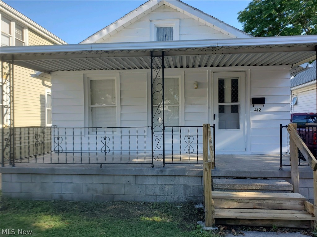 Welcome home to this 3 bedroom, 1 bath fully remodeled home. Fresh paint, refinished hardwood floors and fresh laminate flooring in the kitchen. This home boasts 2 good sized living areas, large kitchen with tons of cabinet space and basement area to make your own. Drink morning coffee on the covered front porch or enjoy watching thunderstorms. 1 car detached garage with large size backyard great for outdoor entertaining. Home warranty from America's Preferred included!