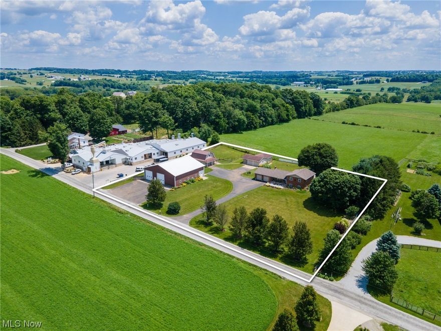 Introducing an exquisite 4-bed, 3-bath home near Fredericksburg on Frease Rd. This split-level home sits on a lot spanning nearly 2 acres, offering unmatched comfort and convenience. The main floor showcases a tastefully designed living room, dining area, and kitchen, creating an inviting ambiance for relaxation and entertainment. Upstairs, discover 3 bedrooms accompanied by 2 immaculate full bathrooms. Experience elevated living with a two-tier deck at the rear, accessible from both the upper level and main floor. Descend to the lower level and find a welcoming den area, perfect for unwinding. Adjacent is a convenient laundry room with a walkout door and a pristine full bathroom. The cellar is ideal for ample storage options. Completing the home is an attached 2-car garage easily accessible from both the main floor and cellar. Next to the home, a detached 2-car garage is thoughtfully designed with a half bathroom and additional space suitable for an office. The property also boasts a bank barn with a lower-level garage door, offering many options. The lower section houses stalls while the upper section provides ample storage. An impressive 60'x60' truck garage is another notable asset, ingeniously divided into two sections. One section serves as a dedicated wash bay, while the other area functions as parking and workbench space. Both sections containing a 14' garage door. Don't miss your opportunity to make this beautiful property yours! ONSITE AUCTION: AUG. 19, 12:00 PM