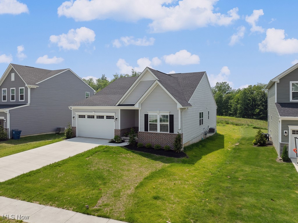 New Listing! Farmhouse Chic Ranch – A True Model Home Gem! Prepare to be charmed by this immaculate 3-bedroom, 2-bathroom ranch home, meticulously crafted to model home standards. Step through the front door and be greeted by the warmth and elegance of farmhouse decor that flows seamlessly throughout. The open floor plan is ideal for both daily living and entertaining featuring a spacious living room with a gas fireplace, a chef's dream kitchen with granite countertops, and generously sized bedrooms. The extra-large primary suite offers a private oasis with a 10-foot tray ceiling with a luxurious en-suite bath with a walk-in closet. Outside, enjoy the luxury of having both a front and rear covered porch to enjoy after a long day at work. Located in the desirable Hickory Creek subdivision, this home offers convenience and style with a beautiful backyard space that backs up to farmland with views of a pond. In addition, you will have easy access to I-76 and local shopping just minutes away. This is the one you've been waiting for!