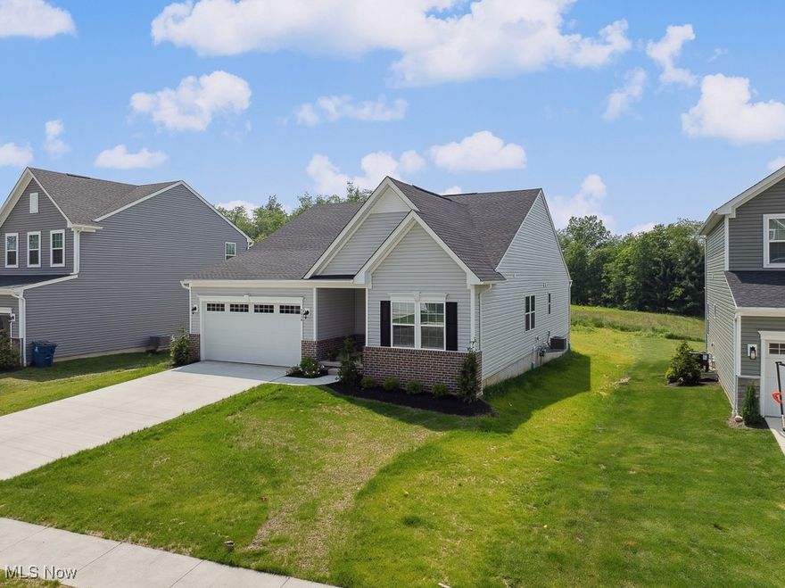 New Listing! Farmhouse Chic Ranch – A True Model Home Gem! Prepare to be charmed by this immaculate 3-bedroom, 2-bathroom ranch home, meticulously crafted to model home standards. Step through the front door and be greeted by the warmth and elegance of farmhouse decor that flows seamlessly throughout. The open floor plan is ideal for both daily living and entertaining featuring a spacious living room with a gas fireplace, a chef's dream kitchen with granite countertops, and generously sized bedrooms. The extra-large primary suite offers a private oasis with a 10-foot tray ceiling with a luxurious en-suite bath with a walk-in closet. Outside, enjoy the luxury of having both a front and rear covered porch to enjoy after a long day at work.  Located in the desirable Hickory Creek subdivision, this home offers convenience and style with a beautiful backyard space that backs up to farmland with views of a pond.  In addition, you will have easy access to I-76 and local shopping just minutes away. Seller has an assumable FHA loan significantly lower than current market rate--inquire for details! This is the one you've been waiting for!