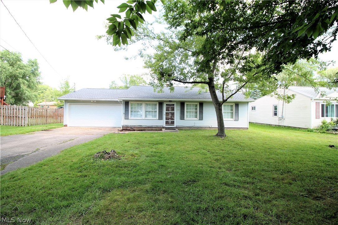 Welcome home to this freshly painted charming three bedroom, one full bath ranch home! Come on into the living room which offers a large window to let the sun shine through and has dining room area. The large kitchen with eat in area has lots of cabinets and counter space. There are three bedrooms and the master suite has new flooring 2019. The fabulous updated bathroom was redone in 2019. The picture perfect backyard offers a patio for entertaining or just relaxing. There is a two car garage with a new garage door in 2016 and a new garage door opener in 2017. Some updates include new A/C and furnace 2016, roof 2016, new electrical panel. There are so many precious memories that start right here!