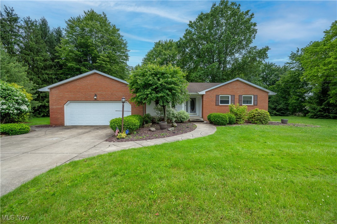 Nestled on a peaceful dead-end street in one of Austintown’s most sought-after areas, this well-maintained one-owner 2,026 square foot home offers space, comfort, and convenience on a sprawling 1-acre lot in close proximity to the Mill Creek Bikeway. Step onto the covered front porch before heading inside to discover a thoughtfully designed layout. The inviting living room welcomes you with warmth, while the adjacent dining room provides the perfect setting for gatherings and meals. The family room, featuring a gas fireplace and beamed ceiling, adds extra charm and coziness. The fully equipped kitchen offers modern functionality with plenty of storage and workspace. This home boasts three bedrooms and two baths, including a unique first-floor laundry hookup cleverly tucked into a bedroom closet, with an additional laundry hookup in the basement for added flexibility. Speaking of the basement—it has a ton or room for storage, it’s waterproofed with a transferable warranty and it includes a dedicated office space, ideal for remote work or hobbies. Enjoy all four seasons in the spacious four-season room overlooking the private backard, or step onto the deck to soak in the beauty of your private backyard retreat. There is also a 2 car attached garage with extra room for storage of your tools. Don’t miss out on this rare opportunity to own a home that combines timeless charm, thoughtful upgrades, and an unbeatable location!