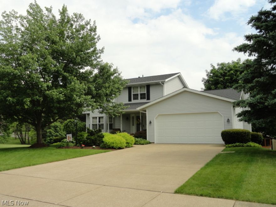 Impeccably maintained and beautifully updated with new carpeting, granite counter tops and new appliances in Kitchen, updated baths, new roof 2014, furnace, air, humidifier in 2010. Nice open, light and bright floor plan, first floor Laundry and fantastic finished walk-out lower level with third bath. Enjoy the park-like large backyard from the deck with retractable awning and screening. Private cul-de-sac too!