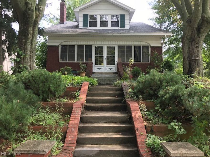 Just Like An Old Western Bungalow But A Super-Sized Double! This Home Has Fantastic Woodwork, Trim, Original Hardwood Floors And Stained Glass Finishes! A Decorative Fireplace Centers The Main Wall In The Parlor And The Enclosed Front Porch Is Nice To Sit And Relax On Any Type Of Day! All Appliances Stay In Both Units! Basement Offers Bonus Space With Kitchenette, Extra Rooms And A Full Bath! This Home Was Recently Rewired And Outfitted With A New Electric Panel A Few Months Ago! Main Bathroom Completely Renovated And Painted Plus...Offers A Bidet Too!! All Bedrooms In Both Units Freshly Pained And New Carpet Has Just Been Installed! Roof Was Done In 2010, H2O Tank In 2015, New Interior Gas Line In 2017, & All PEX Plumbing In Upper Unit! 2 Car Detached Garage Is Spacious And There Is A Large Concrete Patio With Tree-Shaded Cover For Outside Entertaining. Gas Grill Is Hooked Up And Ready To Go! Fenced In! City Lot To The East Could Be Available To Purchase! Located Minutes From The Good