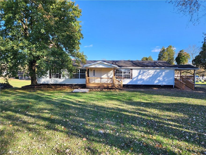 IMMEDIATE POSSESSION AVAILABLE! Clean. Spacious. Turn-key. This 3 Bedroom, 2 Full Bath Home built in 2001 on a HUGE double lot (0.633 acres) accompanied by a 24x28 detached garage is now available for new owners. Positioned on a dead end street with quiet neighbors, this first floor living home has a handicap ramp has 90% brand new flooring, a new toilet and updated landscaping. All kitchen appliances (stove, refrigerator and dishwasher) will convey to the new owners at a successful closing. This unique property has city utilities, a large open kitchen with an island and plenty of cabinets and separate dining area, as well as a large master bedroom with master bath (including a garden tub!), spacious rooms, The detached garage was built in 2004 and has electric, a concrete floor, overhead storage and an automatic garage door opener. Sellers are providing a 12 month home warranty with this property to the new owners at a successful closing. Remove shoes or wear provided shoe covers. Contact a licensed real estate agent for a private showing.