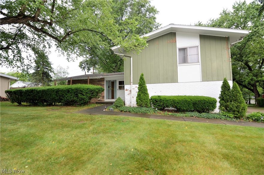 This home is situated in a beautiful neighborhood.  It needs updating, but has a lot to offer.  It's been lived in gently it's just dated.  There are 3 good sized bedrooms, and 2 full baths.  It has a basement, lower level family room, eat in kitchen with glass doors to a patio, formal dining area, kitchen with appliances, living room with fireplace.  All this on a lovely treed lot.