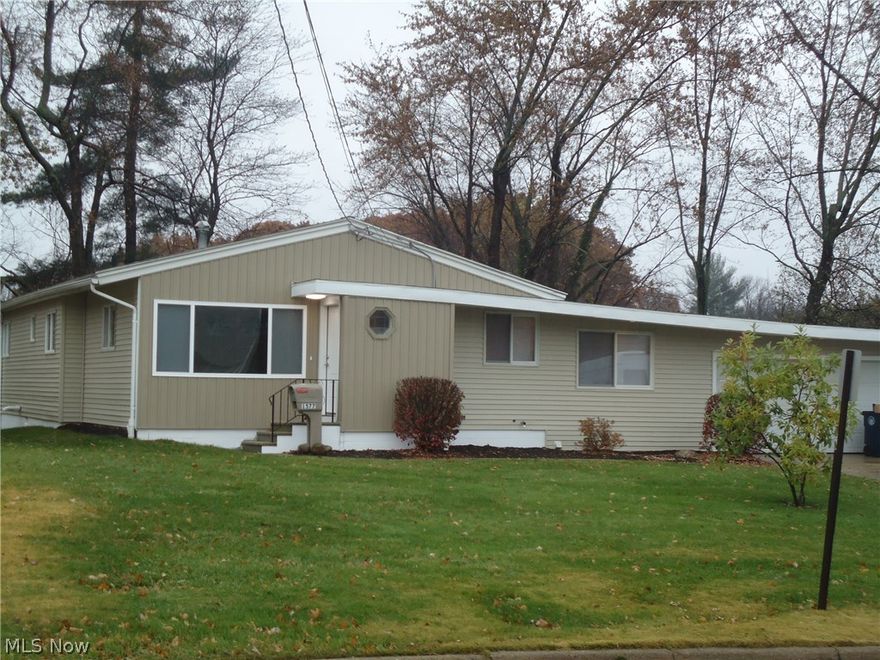 MOVE IN CONDITION!!  Like new spacious 4 bedroom/2 bath Ranch home on double lot.  Features include beautiful hardwood flooring, neutral décor, crown molding & so much more. Remodeled kitchen with new stainless appliances -- new vinyl siding (2017)-- new roof (2016)-- new furnace & central air (2017)-- newer doors & windows. Family room leading to huge sunroom/enclosed porch perfect for entertaining or relaxing.  2 car attached garage and concrete patio. 
Large basement perfect for storage-workshop or man cave! Home warranty included!