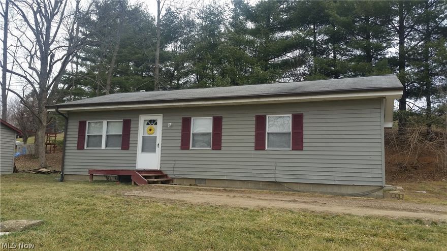 Ranch home with 3 bedrooms located on a nice acre corner lot. Some updates. Room sizes are good with a pleasant layout. Storage building. East Muskingum schools but also convenient to Meadowbrook and city of Cambridge.