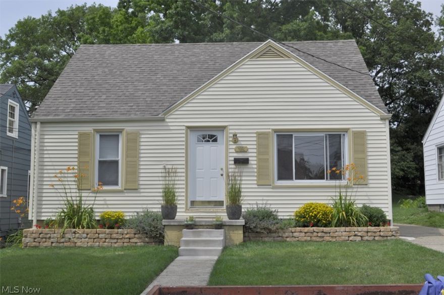 Character counts in this three bedroom bungalow where pride of ownership starts at the curb. Updated eat in kitchen '07 with ceramic tile floor and countertops, built in wine rack and modern appliances that stay. Complete bathroom remodel with new tub surround, fixtures and flooring. All new lighting fixtures throughout the house. Plumbing and 200 amp electric updated in '07. Finished lower level with built in refrigerator, can lighting, shelving, access doors for mechanicals, glass block and separate utility room.. Updated 95% efficient funace and central air '09, vinyl windows, roof. Privacy fenced backyard sanctuary with newer concrete patio, stone patio and picnic deck. Gorgeous Landscaping features blooms throughout the summer. Brand New garage built in 2010 with 220 outlet and subpanel.