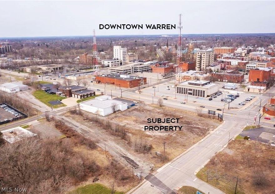 Great Opportunity in Warren Ohio! Location prime for any type of business. Large corner lot situated in the heart of Warren City Downtown! Walking distance to Courthouse Square, restaurants, coffee shops, art galleries, amphitheater, as well as residential condos and apartments. This corner lot also has frontage on Youngstown Rd with very high traffic counts.