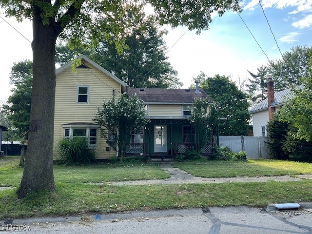 This home is located within walking distance to downtown shopping and dining. Large fenced yard. Two car garage has a large room in back that could be used for storage or whatever you decide. Kitchen has lots of counter space. Large front porch for relaxing. Don't miss out. Come see and make this your home!